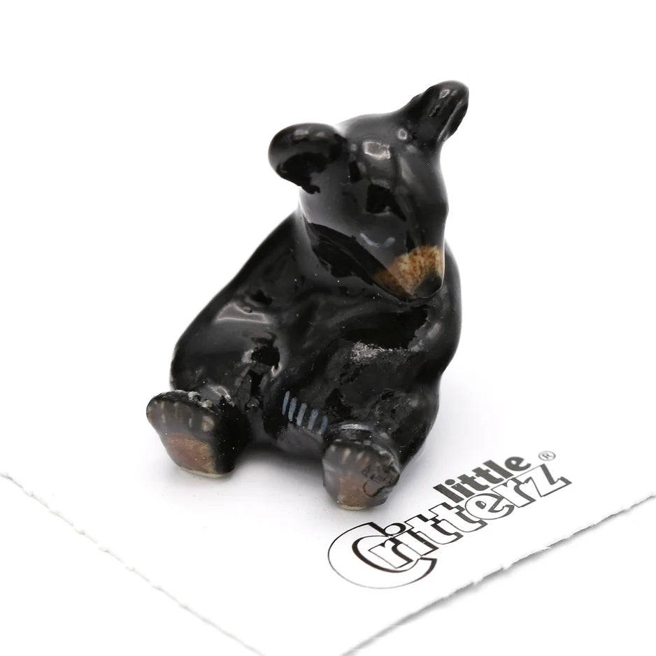Miniature Porcelain Figurine