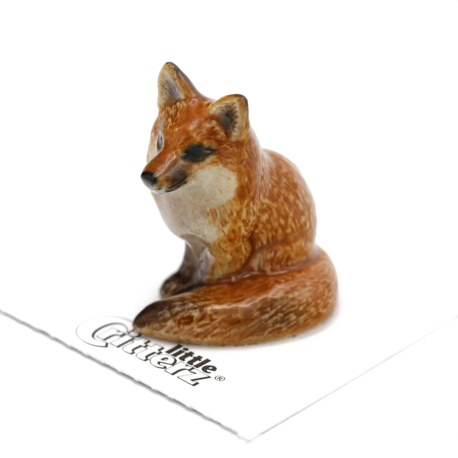 Miniature Porcelain Figurine