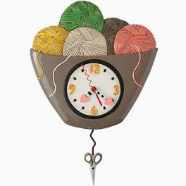 Sculpted Wall Clock with a Fun Pendulum