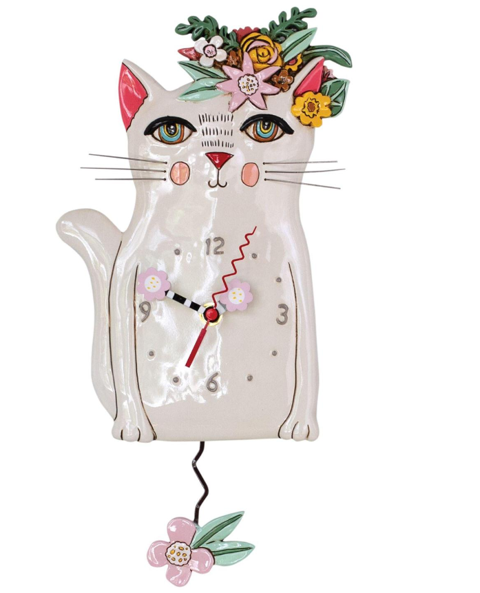 Sculpted Wall Clock with a Fun Pendulum