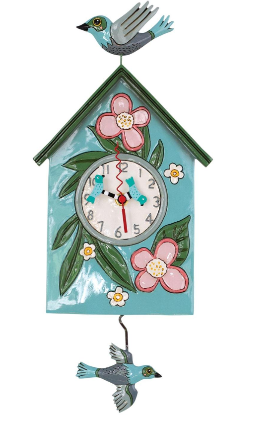 Sculpted Wall Clock with a Fun Pendulum
