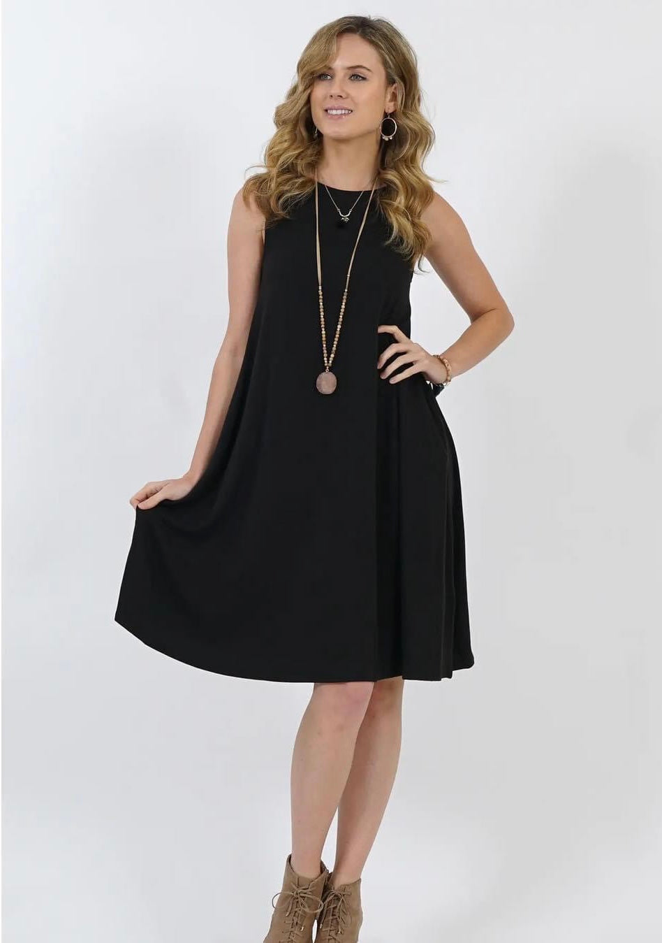 Sleeveless Flared Dress with Side Pockets