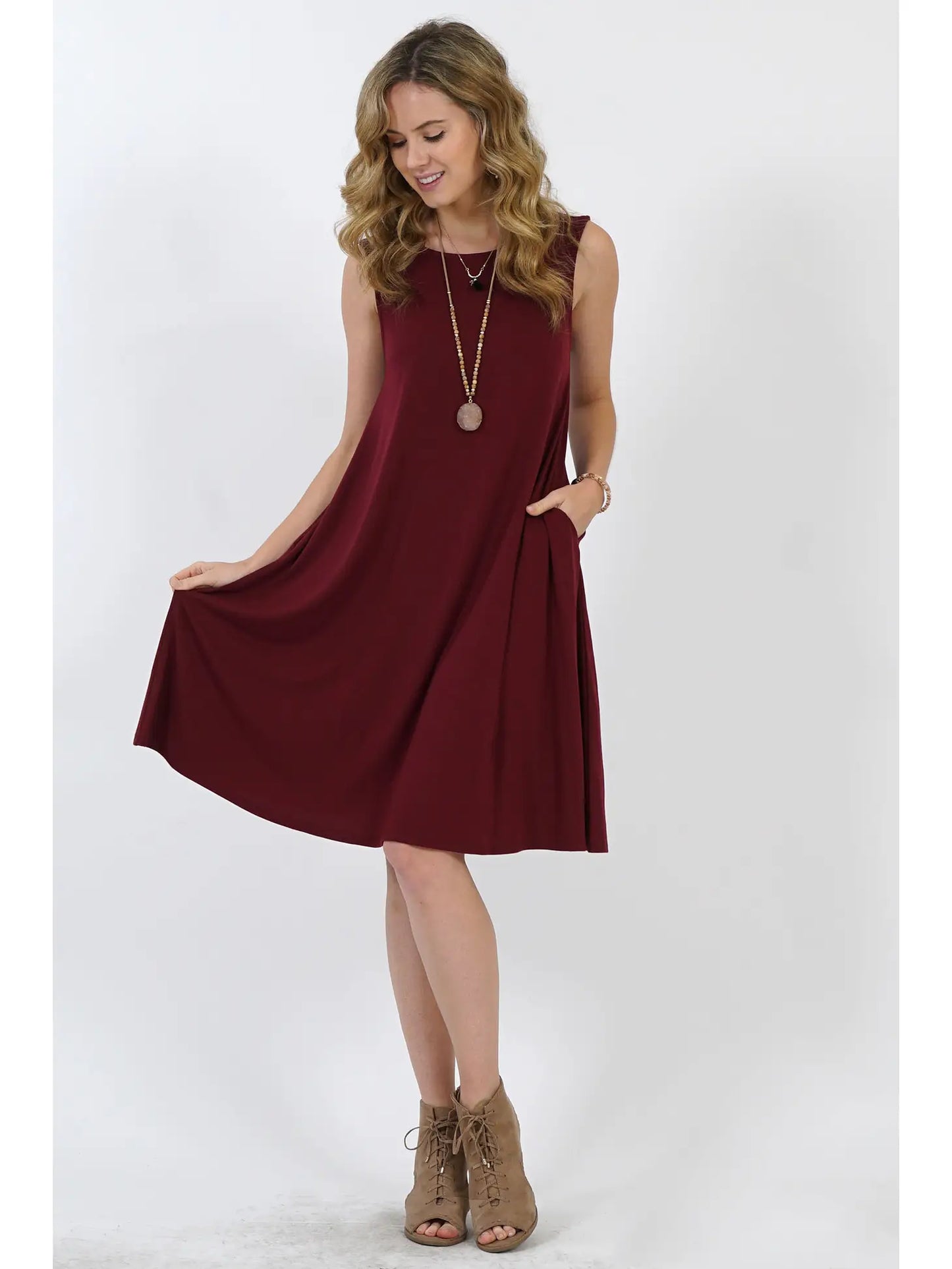 Sleeveless Flared Dress with Side Pockets