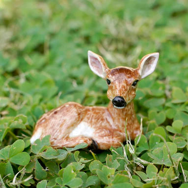 Miniature Porcelain Figurine